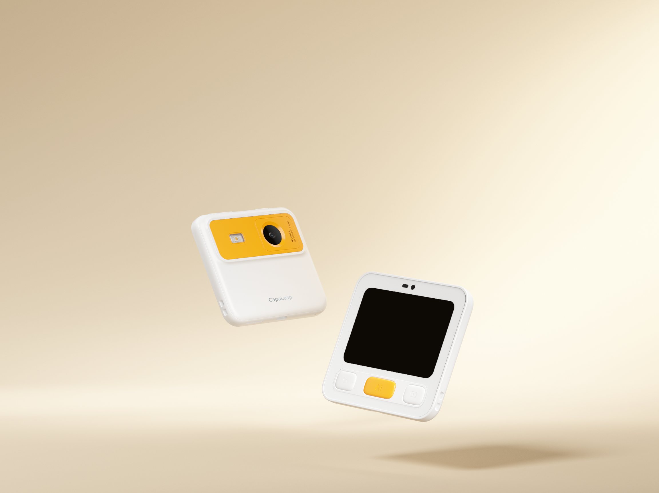 Two white CapaNote learning devices in a warm-toned space